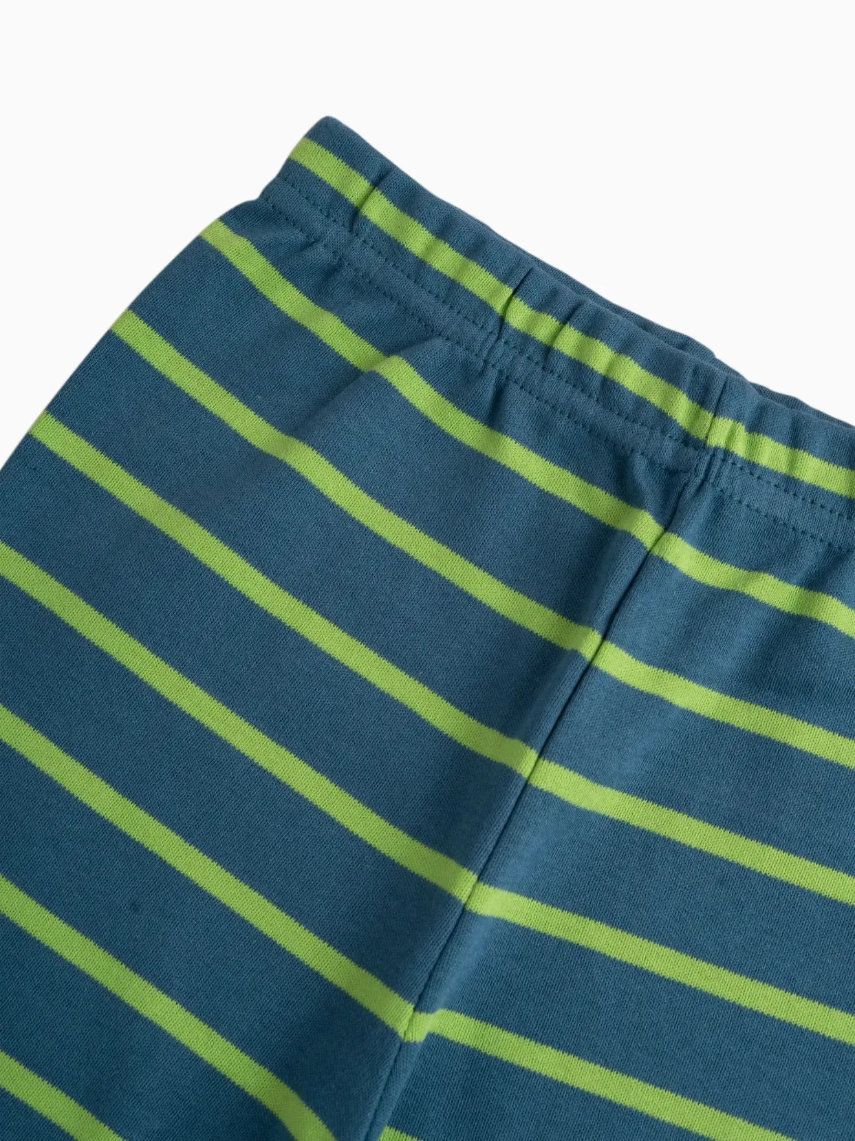 Light green pattern in blue leggings  for baby girl